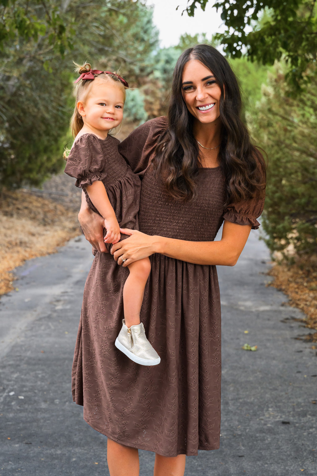 Family Brown Dress & Flannel - GIRL-6-12 Months-FAMILY - Brown knee-length dress with short puff sleeves and gathered waist, worn by woman and child.