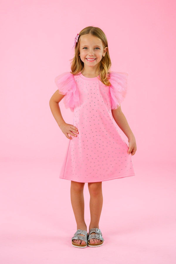 Pink Rhinestone Dress - 6-12 Months - Light pink knee-length dress with puffed short sleeves and sparkling rhinestone details, worn by a smiling young girl.