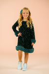 Sparkle Plush Sequin Long Sleeve Dress - Green / 6-12 Months - Black plush long sleeve dress with teal sequin trim on cuffs and hem, worn by young girl.
