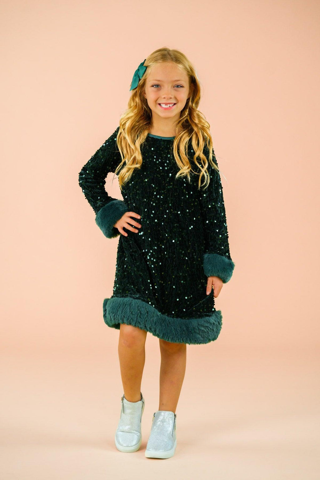Sparkle Plush Sequin Long Sleeve Dress - Green / 6-12 Months - Black plush long sleeve dress with teal sequin trim on cuffs and hem, worn by young girl.