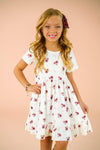 Pink Flowers & Bows Dress - 6-12 Months - White short-sleeve dress with pink and purple floral print, ruffled hem, and a matching pink bow in hair.