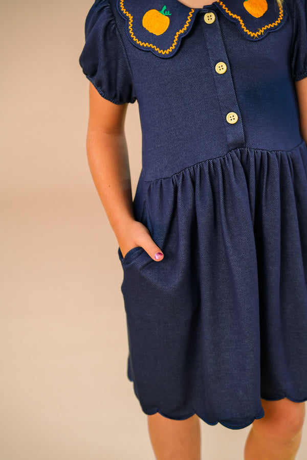 Faux Denim Pumpkin Dress - 6-12 Months - Navy blue faux denim pumpkin dress with scalloped hem, puff sleeves, front buttons, and decorative collar with orange.