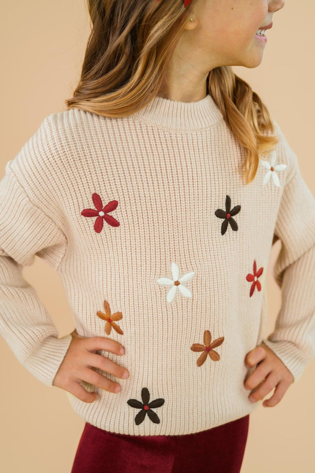 Knit Flower Print Sweater Bell Bottom Set - 3XS-6-12 Months - Cream knit sweater with ribbed texture and multicolored floral appliques in red, brown, white, and black.