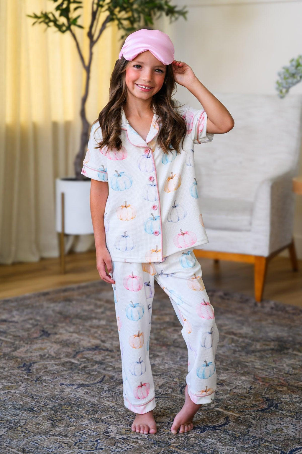 Mom & Me - Pastel Pumpkin Waffle Knit Pajamas - CHILD-6-12 Months - Girls’ pastel pumpkin waffle knit pajamas with short-sleeve button-up top and matching pants, paired with a pink sleep mask.