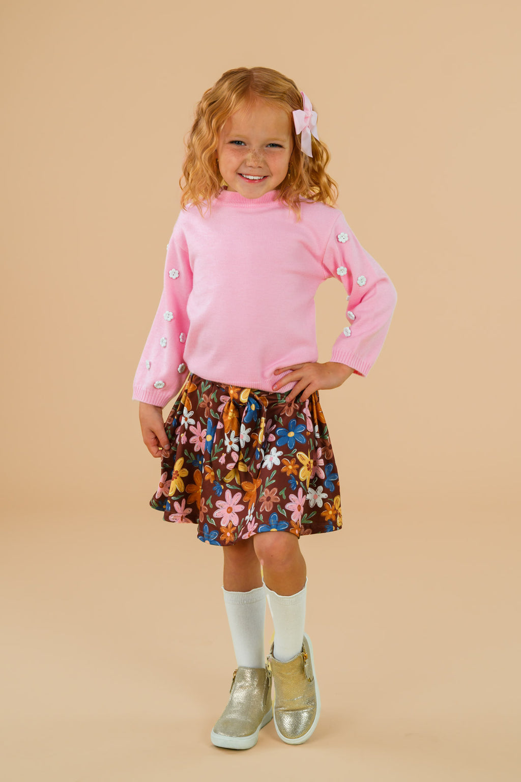 Pink & Brown Floral Skirt Set - 6-12 Months - Pink long-sleeve top with puffed sleeves paired with a brown skirt featuring colorful floral prints.