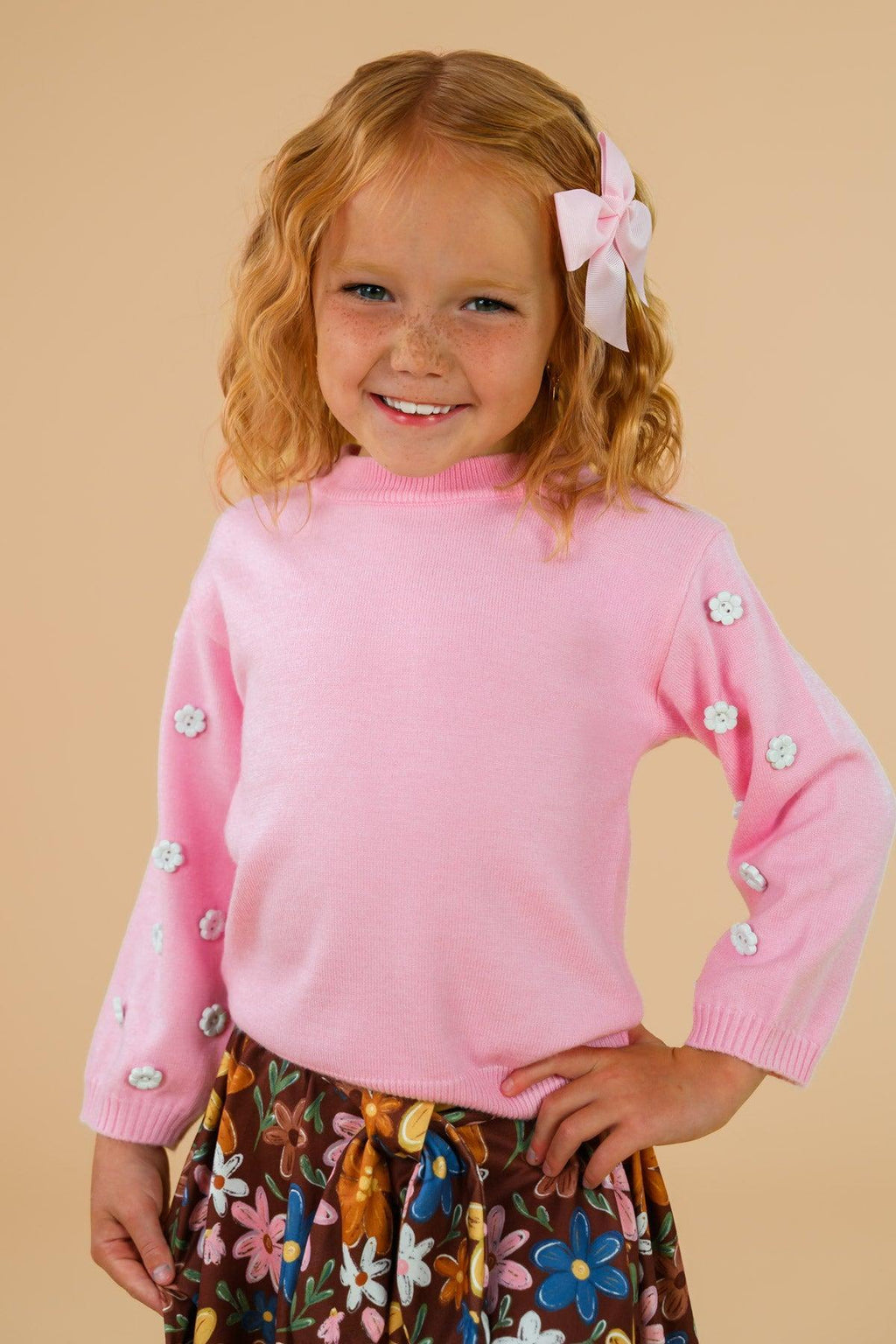 Pink & Brown Floral Skirt Set - 6-12 Months - Pink long-sleeve top with button details on sleeves paired with a brown floral skirt with blue and pink flowers.