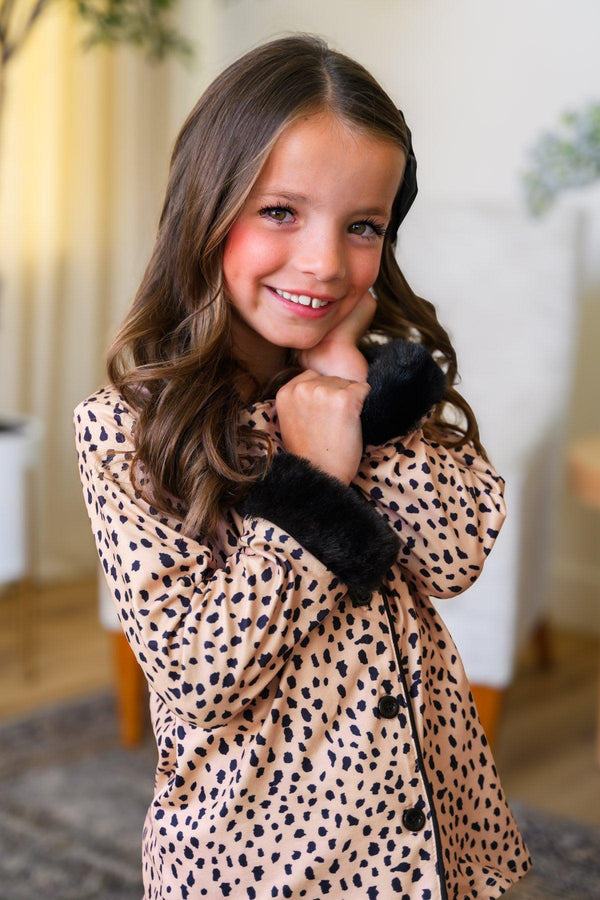 Mom & Me - Fuzzy Cheetah Pajamas - CHILD-6-12 Months - Child wearing fuzzy cheetah-print pajamas with black cuffs and collar, smiling indoors.