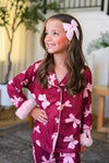 Mom & Me - Fuzzy Pink Bow Pajamas - CHILD-6-12 Months - Burgundy fuzzy pajamas with large pink bows, button-up top, and fluffy pink cuffs worn by a smiling young girl with matching