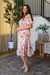 Mom & Me - Floral Fall Watercolor Dress - CHILD-6-12 Months - Cream midi dress with orange and brown floral watercolor print, puff sleeves, and flowy skirt.