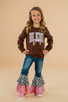 "Be Kind" Cheetah Denim Bell Bottom Set - 6-12 Months - Brown long-sleeve shirt with "Be Kind" text paired with denim bell bottom pants featuring layered cheetah and pink ruffle.