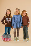 "Be Kind" Cheetah Denim Bell Bottom Set - 6-12 Months - Brown bell-bottom jeans with leopard print ruffles, blue denim dress with leopard leggings, and brown top with bell-bottom.