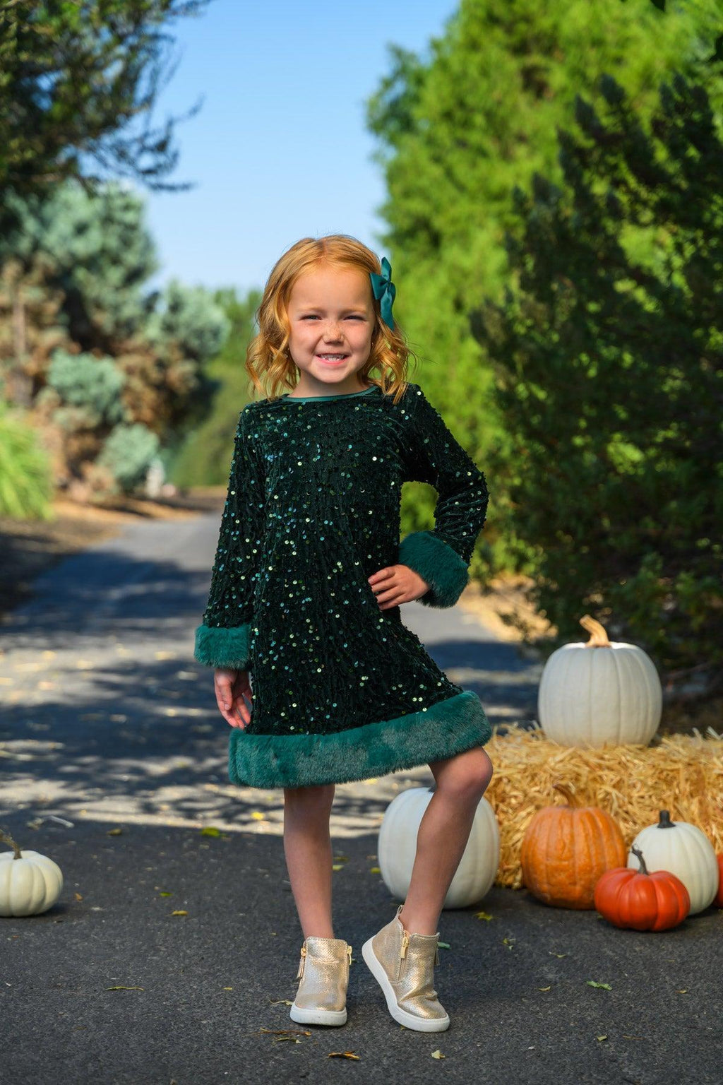 Sparkle Plush Sequin Long Sleeve Dress - Green / 6-12 Months - Dark green plush sequin long sleeve dress with velvet trim on hem and cuffs, worn with gold sneakers.