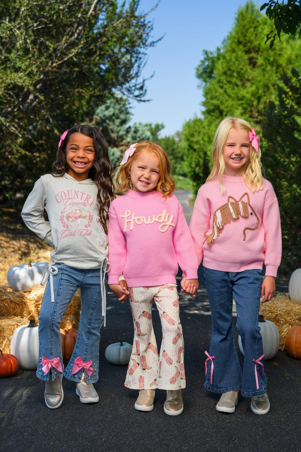 "Country Coquette Girls Club" Denim Flare Set - 6-12 Months - Girls wearing gray long-sleeve top, pink "Howdy" sweatshirt, and pink graphic sweatshirt paired with blue denim flare jeans.