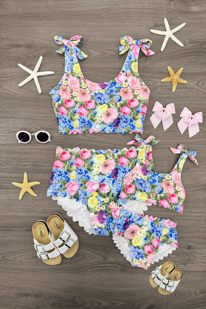 Mom & Me - Floral Bikini - CHILD-6-12 Months - Matching mom and toddler floral bikini sets with ruffled bottoms, colorful pink, blue, and yellow flowers on white background.