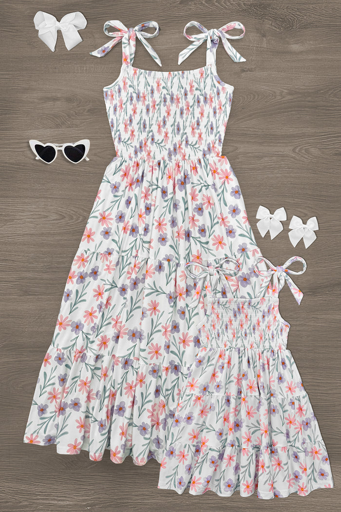 Mom & Me - Pink & Purple Floral Dress - CHILD-6-12 Months - Matching pink and purple floral dresses with tie shoulder straps and tiered skirts, accompanied by white hair bows and.