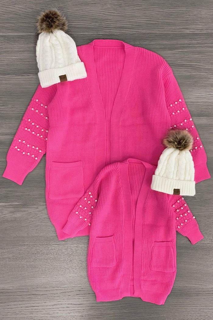 Mom & Me - Pink Pearl Cardigan Sweater - CHILD-3XS-6-12 Months - Matching bright pink pearl-embellished cardigans for mom and child with front pockets, paired with white knit pom-pom beanies.