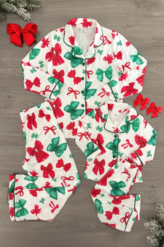 Mom & Me - Red & Green Bow Pajamas - CHILD-6-12 Months - Matching red and green bow print pajamas with black piping for mom and child, featuring button-up tops and pants.