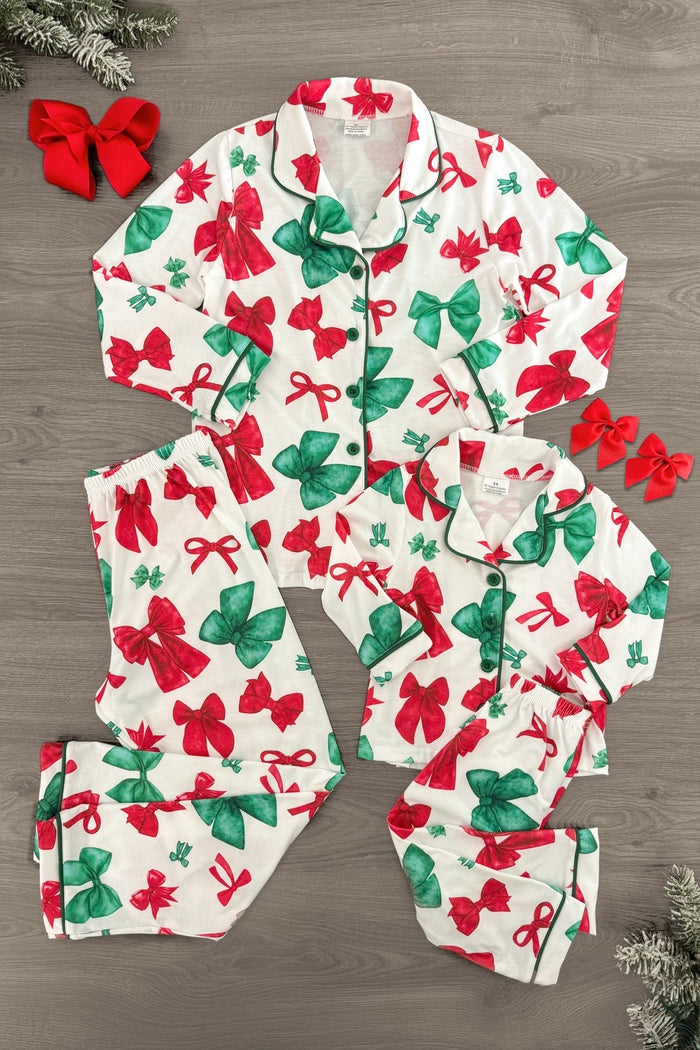 Mom & Me - Red & Green Bow Pajamas - CHILD-6-12 Months - Matching red and green bow print pajamas with black piping for mom and child, featuring button-up tops and pants.