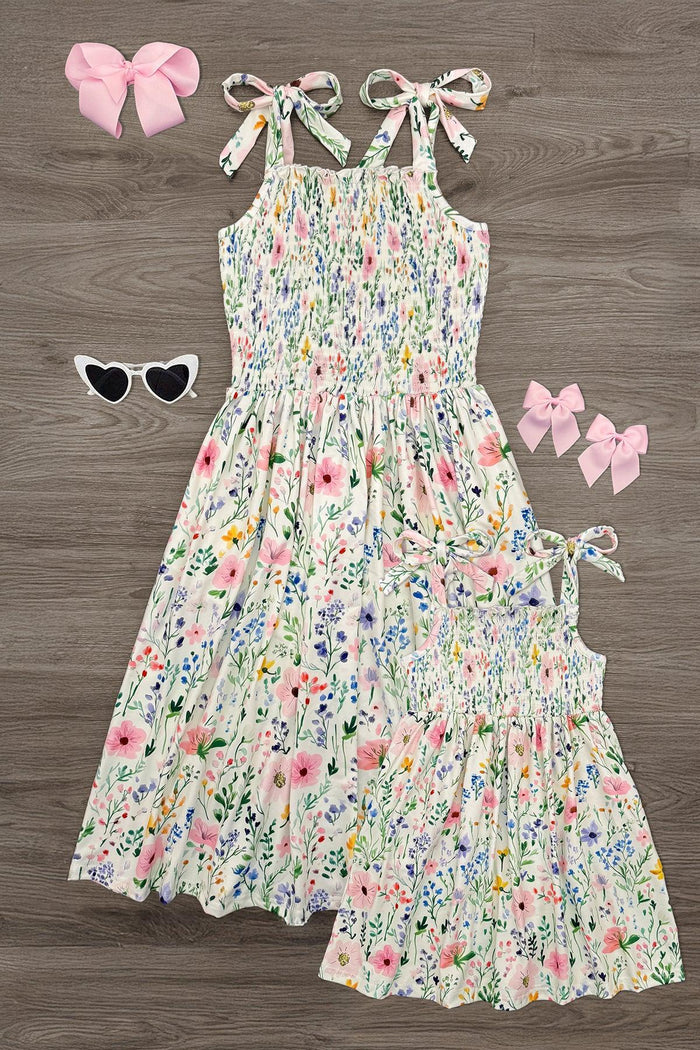 Mom & Me - Spring Floral Tank Dress - CHILD-6-12 Months - Matching cream floral tank dresses for mom and child with tie shoulder straps and smocked bodices.