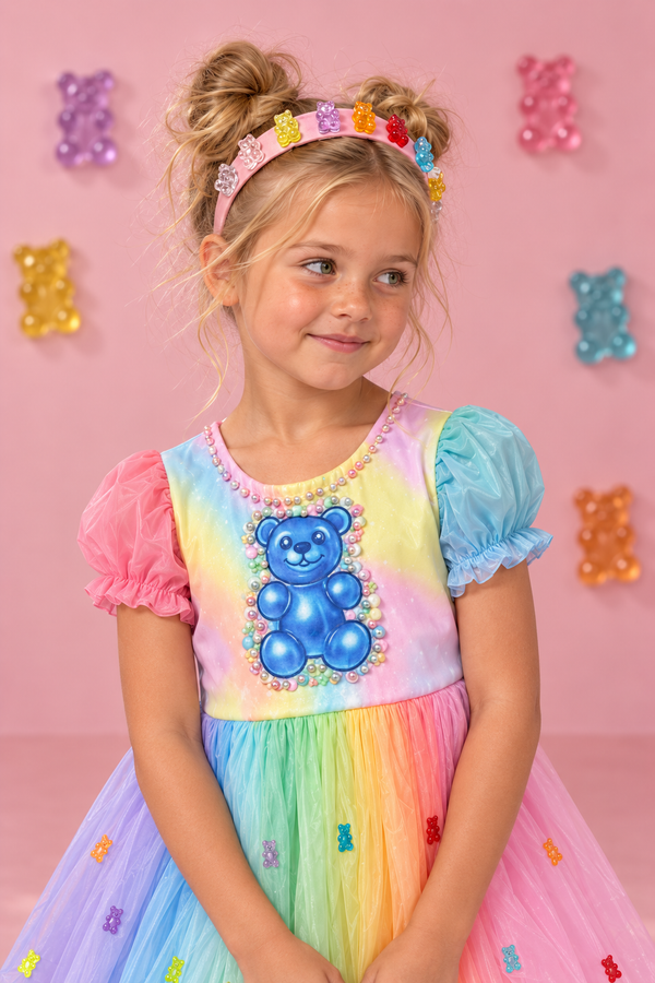 Gummy Bear Costume - 6-12 Months - Rainbow-colored tulle dress with puffed pink and blue sleeves, featuring a shiny blue gummy bear on the bodice and a.