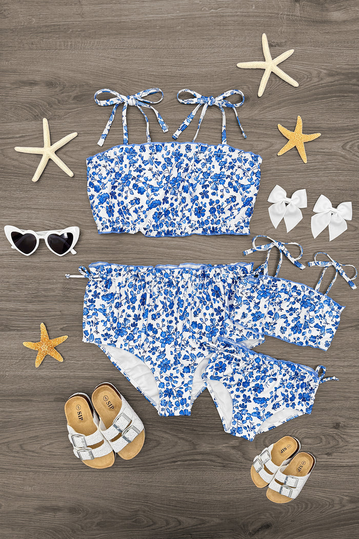 Mom & Me - Blue Floral Ruffle Bikini - CHILD-6-12 Months - Blue floral ruffle bikini set for mom and child with tie straps and matching sandals, styled with sunglasses and starfish.