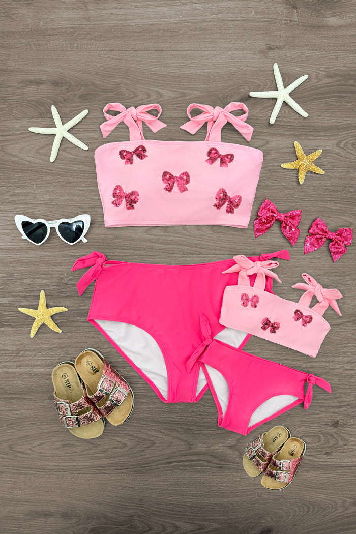 Mom & Me - Pink Sequin Bow Bikini - CHILD-6-12 Months - Pink sequin bow bikini sets for mom and child with matching bows, starfish, sunglasses, and sandals on wood floor.