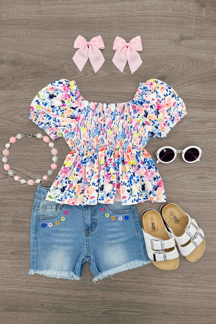 Floral Watercolor Denim Short Set - 6-12 Months - Floral watercolor print smocked top with puff sleeves paired with denim shorts featuring colorful embroidered flowers and.