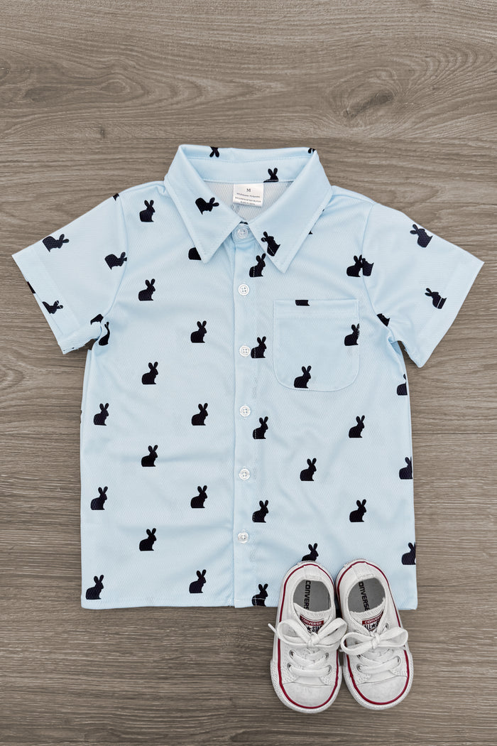 Blue Bunny Button Down - 3XS-6-12 Months - Light blue short-sleeve button-down shirt with black bunny silhouettes and white toddler sneakers with pink trim.