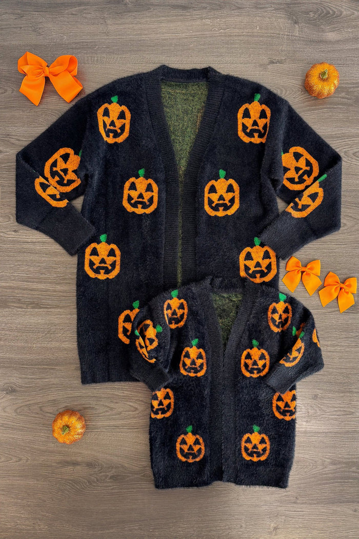 Mom & Me - Cozy Jack-O'-Lantern Cardigan - CHILD-3XS-6-12 Months - Black cardigan set with bright orange jack-o'-lantern pumpkin designs, cozy knit texture.