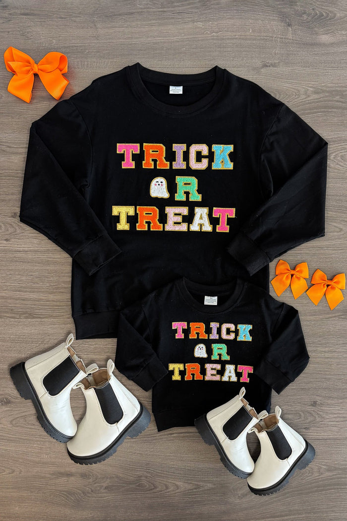 Mom & Me - "Trick Or Treat" Black Chenille Patch Top - CHILD-3XS-6-12 Months - Matching black chenille patch tops with colorful "Trick or Treat" text in rainbow colors, styled with white and brown.