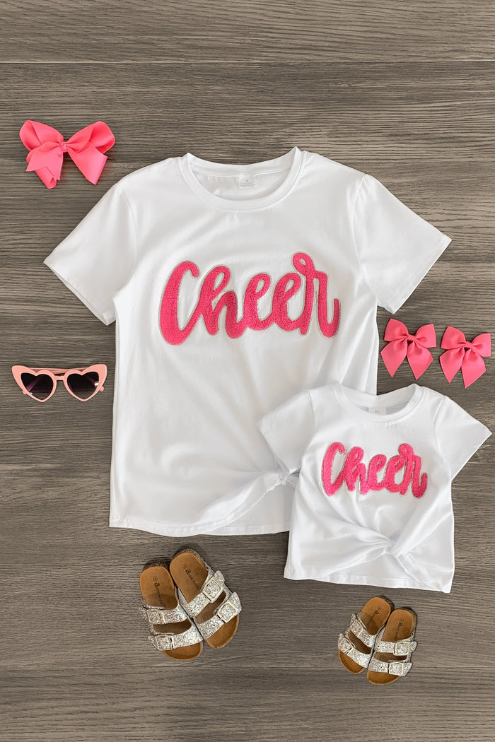 Mom & Me - "Cheer" Chenille Patch Short Sleeve Top - CHILD-3XS-6-12 Months - White short-sleeve top with pink chenille "Cheer" text, paired with matching shoes, pink bows, and heart-shaped sunglasses.