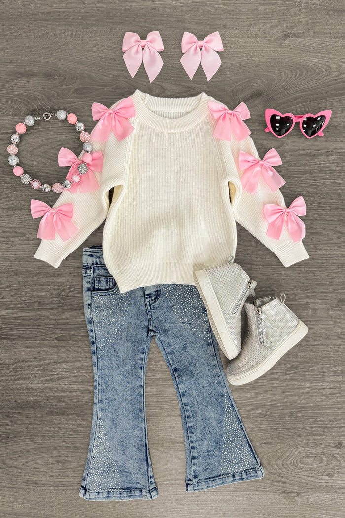 Cream Bow Sweater Sequin Denim Flare Set - 6-12 Months - Cream sweater with pink bows on sleeves, sequin denim flare jeans, white boots, pink bow headbands, and beaded necklace.