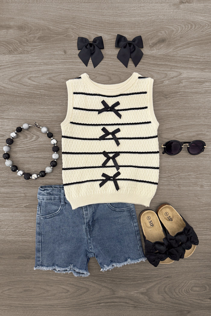 Sweater Vest Denim Short Set - 6-12 Months - Cream sleeveless sweater vest with black stripes and bow details, paired with denim shorts and black hair bows.