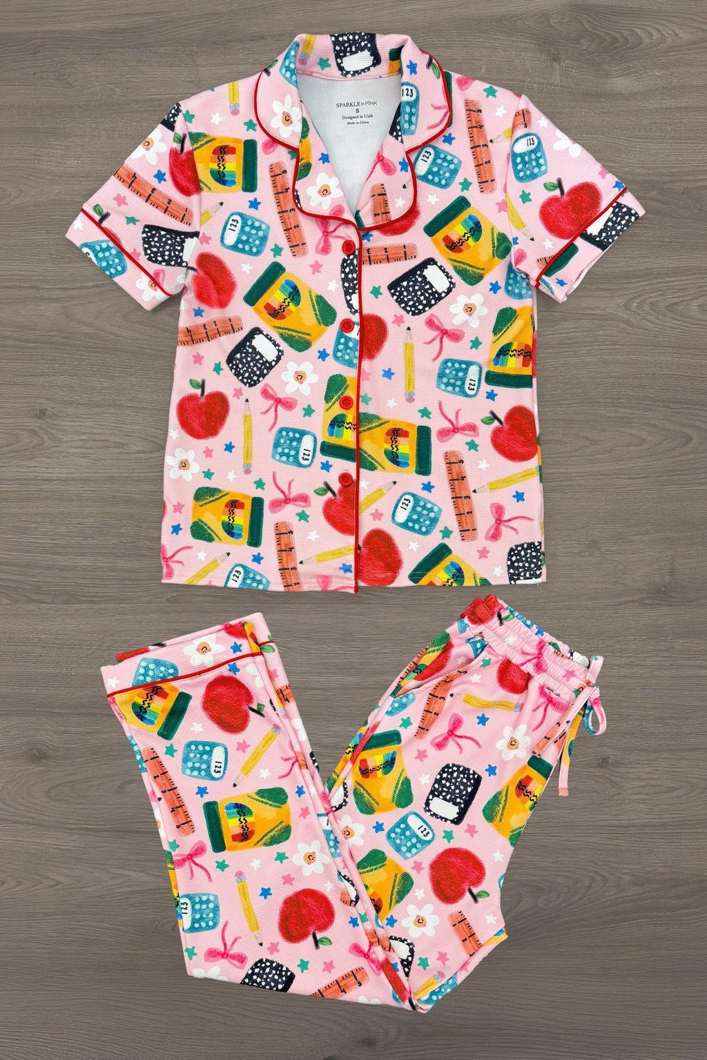 Mom & Me - School Supplies Waffle Knit Pajamas - MOM-XS - Pink waffle knit pajamas with short-sleeve button-up top and pants featuring colorful school supply prints.