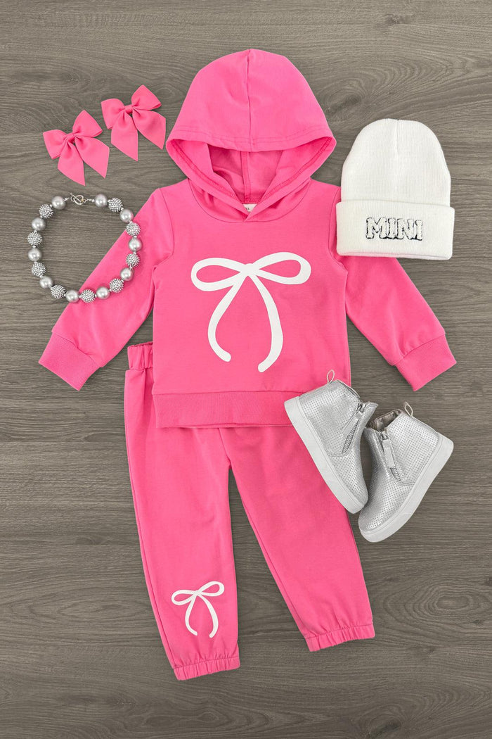 Pink Bow Hoodie Lounge Set - 3XS-6-12 Months - Pink hoodie and pants set with white bow prints, paired with grey boots, white beanie, pink hair bows, and beaded necklace.