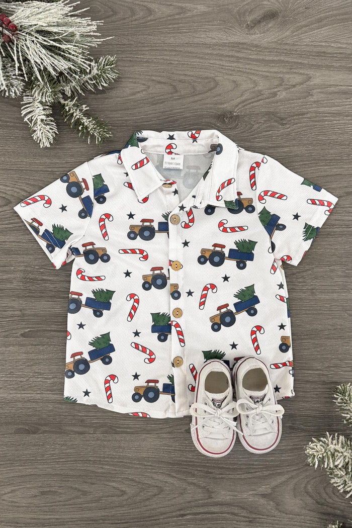 Christmas Tree Button Down Top - 3XS-6-12 Months - Gray short-sleeve button-down top with colorful Christmas tree and holiday vehicle print, paired with white toddler shoes.