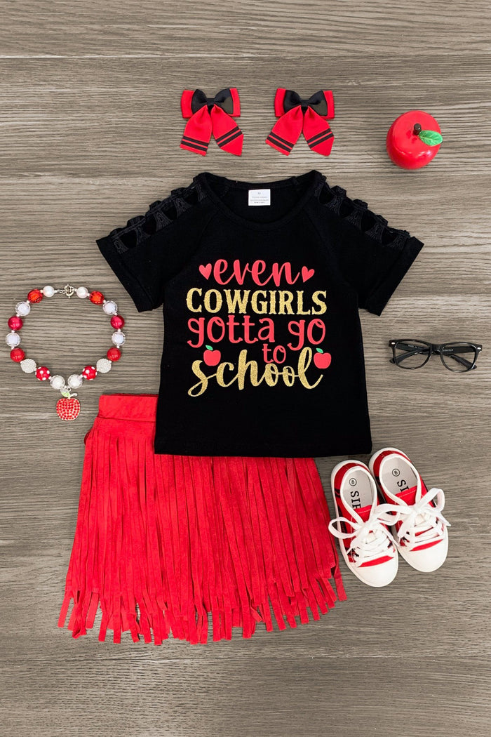 "Even Cowgirls Gotta Go To School" Suede Skirt Set - 3T - Black short-sleeve top with colorful "even cowgirls gotta go to school" text and red suede fringe skirt with white sandals.