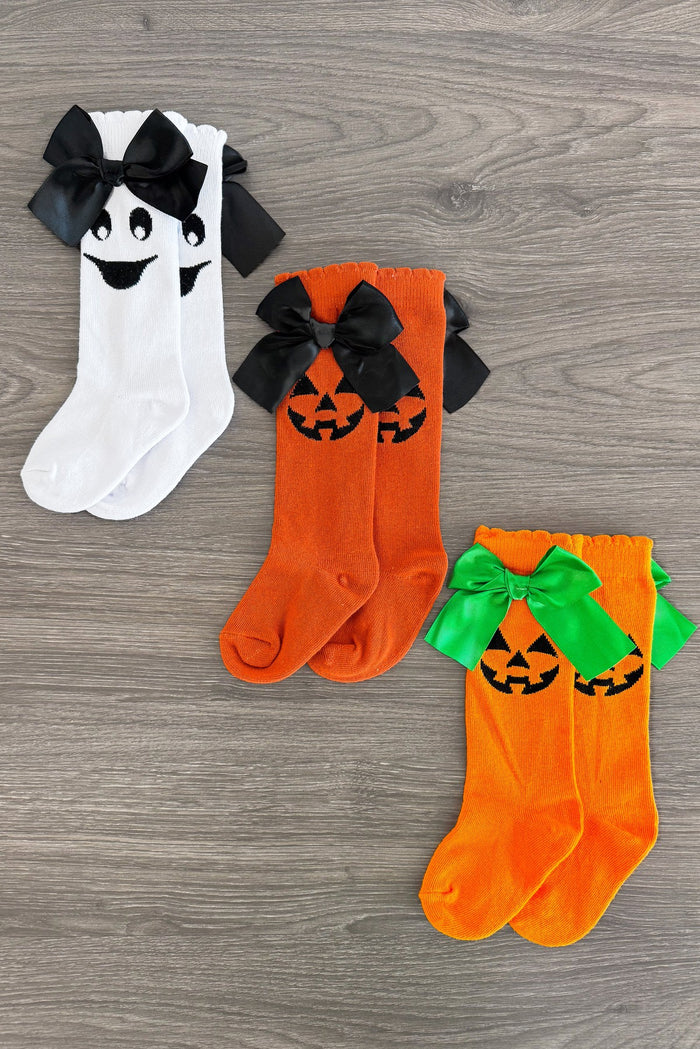Halloween Bow Socks - Orange / Small-3T - White Halloween socks with black ghost face and bow, rust socks with black jack-o'-lantern face and bow, orange socks with.