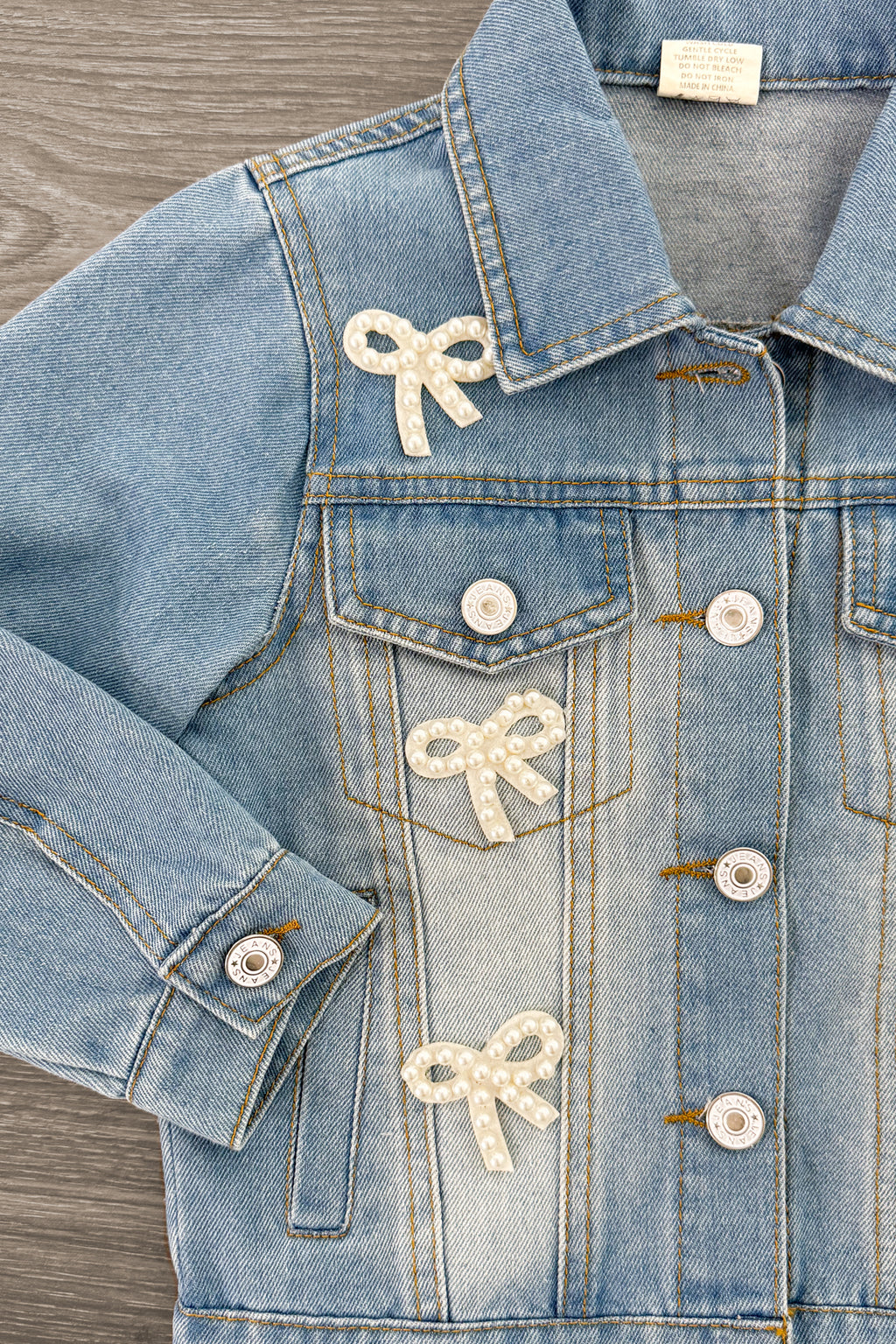 Pearl Bow Denim Jacket | Sparkle in Pink