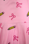 Mom & Me - Pink Pencil & Bow Dress - CHILD-3T - Pink dress fabric with printed pink bows and yellow pencils pattern.