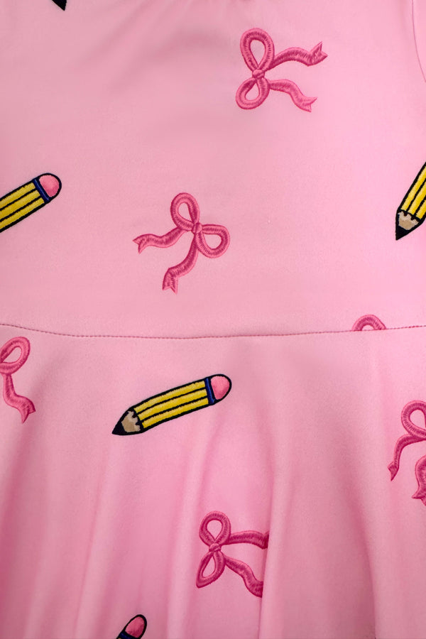 Mom & Me - Pink Pencil & Bow Dress - CHILD-3T - Pink dress fabric with printed pink bows and yellow pencils pattern.