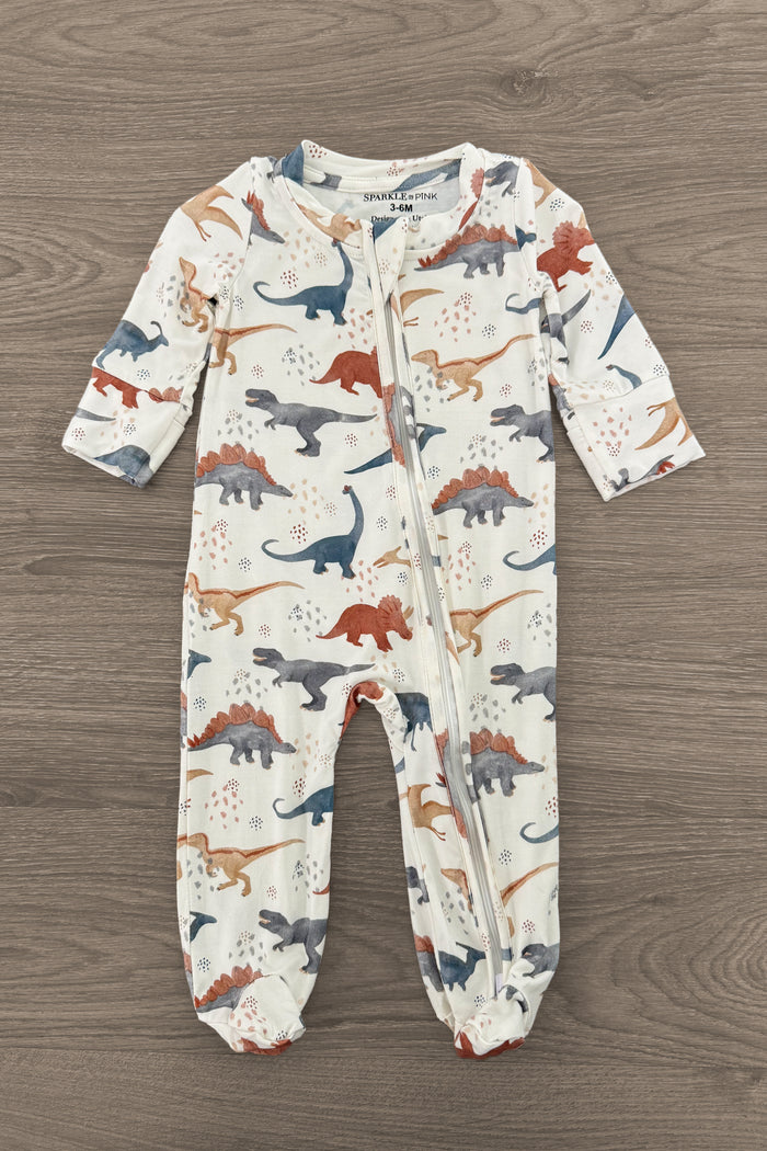 Bamboo Tiny Dino Onesie - Newborn - Cream bamboo onesie with long sleeves and multicolored blue, orange, and tan dinosaur prints.