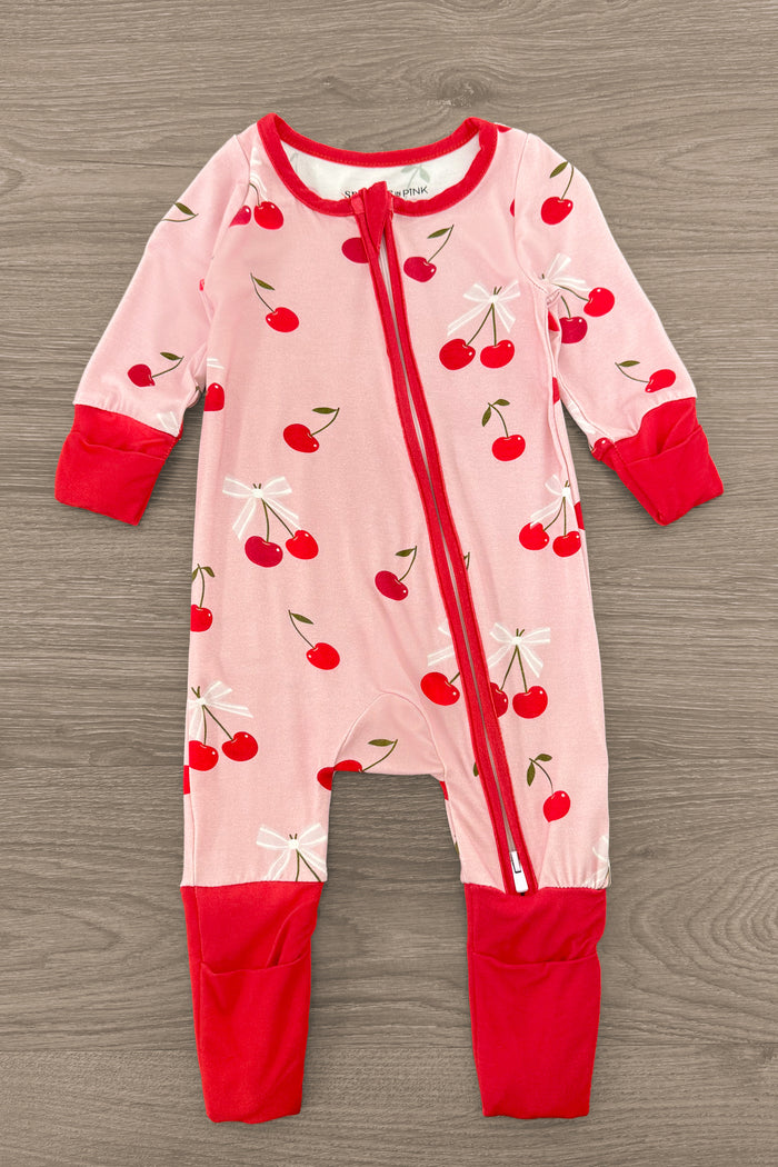 Bamboo Sweet Cherry Onesie - Bib - Pink bamboo onesie with red cherry print, red cuffed sleeves, ankles, and diagonal zipper closure.