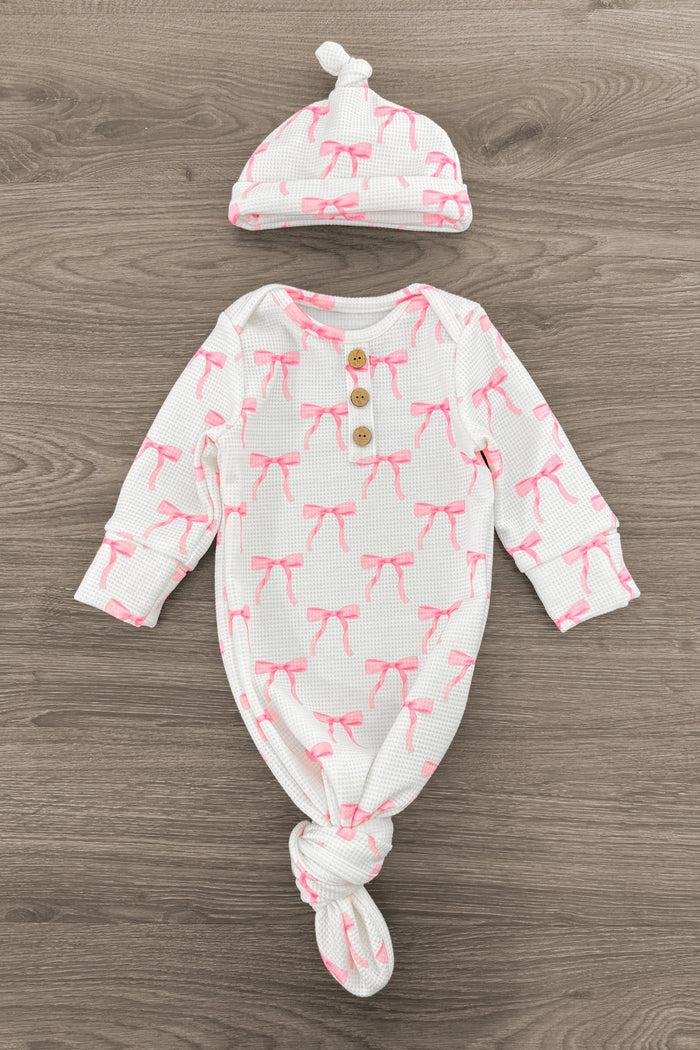 Newborn Baby Blushing Bows Waffle Knit Knot Gown & Hat Set - Default Title - White waffle knit newborn gown and matching knot hat with pink giraffe print and wooden buttons.