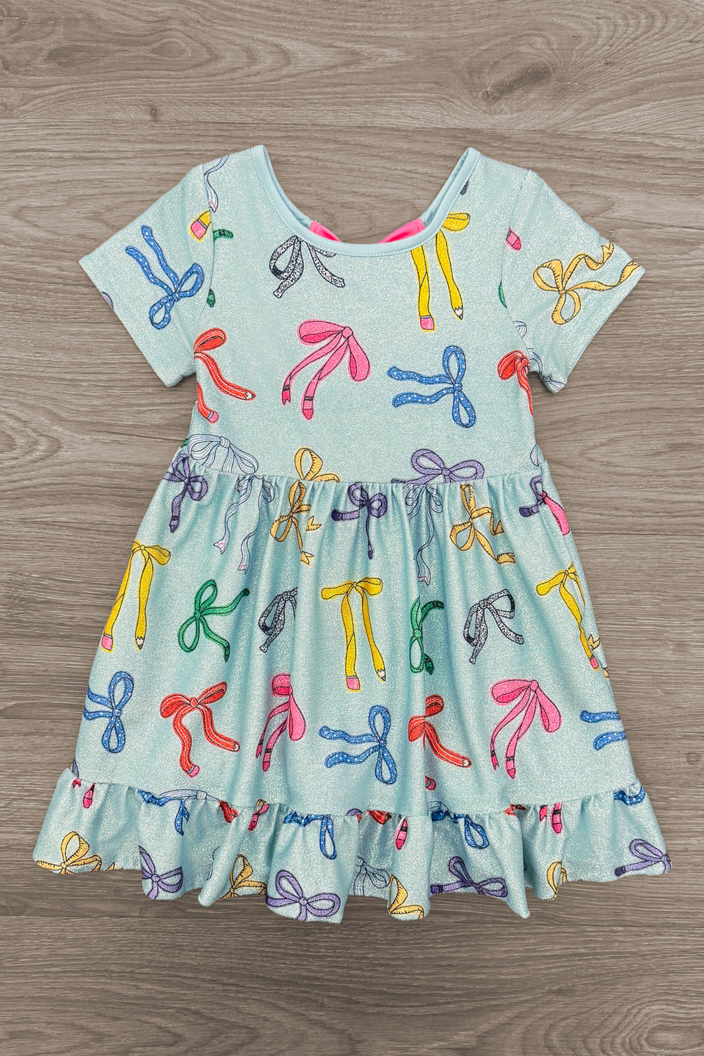 Mint Glitter School Bows Dress - 3T - Mint short-sleeve dress with colorful glitter schoolbow prints and ruffled hem.