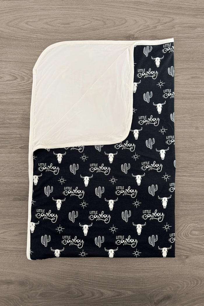 Bamboo "Little Cowboy" Double Sided Blanket - Default Title - Black and white double-sided baby blanket with cowboy-themed prints and solid cream backing.