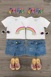 Gemstone Rainbow Denim Short Set - Left Side / 6-12 Months - White toddler t-shirts with rainbow graphic, denim shorts with gemstone rainbow trim, rainbow bow headbands, white.