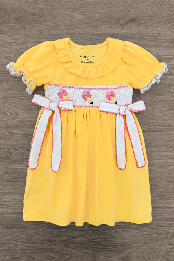 Yellow Pencil & Bows Dress - 3T - Yellow short-sleeve dress with scalloped white lace trim, smocked bodice featuring pink bows, and matching fabric belt with.