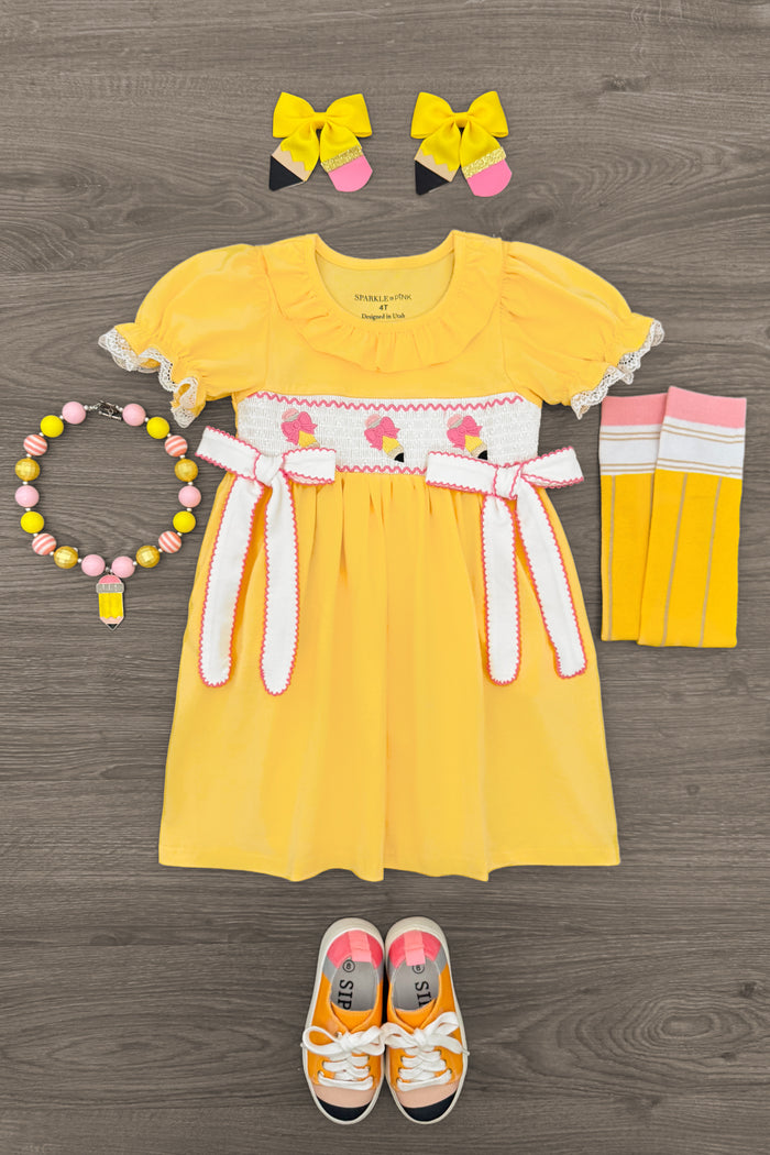 Yellow Pencil & Bows Dress - 3T - Yellow short-sleeve dress with white bow belt and pink pencil print, paired with matching yellow knee socks, pink and yellow