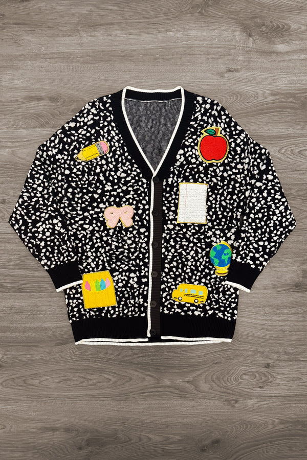 Mom & Me - Composition Sweater Cardigan - CHILD-3T - Black and white speckled cardigan with colorful embroidered patches and white trim.